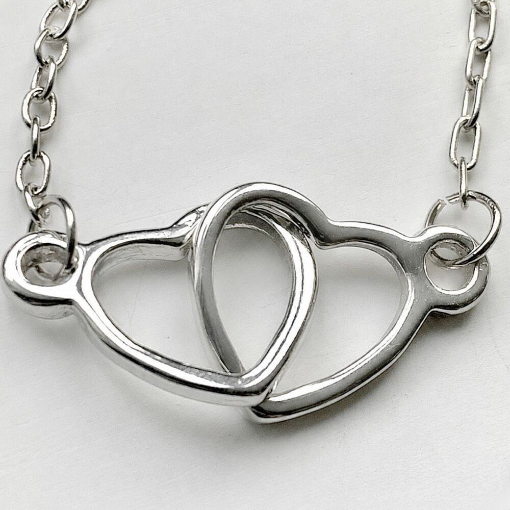 Hugging Hearts Silver Tone Necklace